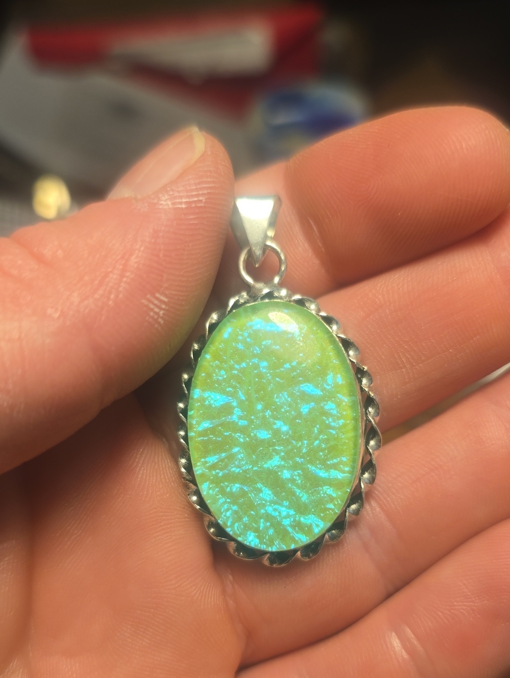 Silver Oval Opal-Effect Pendant in Green-Blue Dichroic Glass